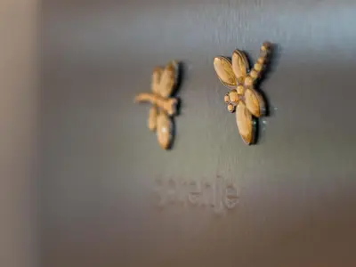 two dried up bananas are sitting on a table at Apartment Tolle Ferienwohnung in Zasip mit Parkplatz by Interhome in Bled