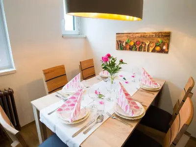 a table with a cake on top of it at Apartment Tolle Ferienwohnung in Zasip mit Parkplatz by Interhome in Bled