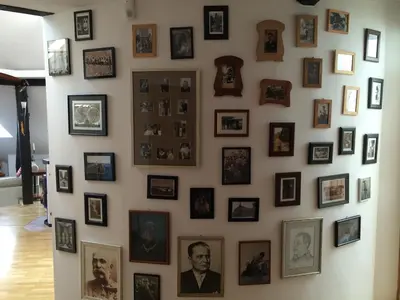a wall with pictures of people on it at Apartment Loft in Ljubljana