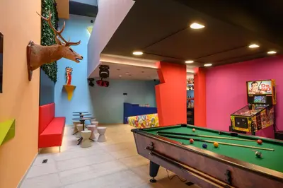a childrens play room with a pool table at Franz Apartments in Ilirska Bistrica