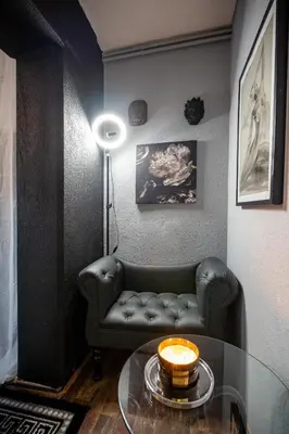 a living room with a couch and a glass table at Apartment Angel's Nest with Sauna and Fitness in Jesenice