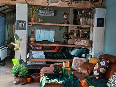 a room with two bunk beds and a table at ROSE ROOM for 4 guests in Rose resort Ljubljana in Ljubljana