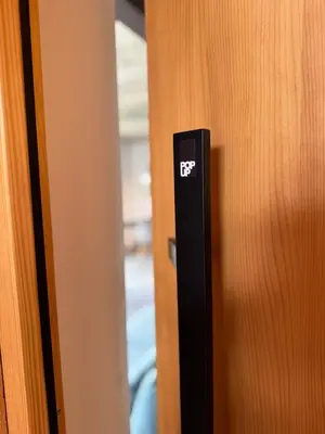 a close up of a door with a sticker on it at Magda POP UP in Šentvid pri Stični