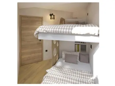 a room with two bunk beds and a door at Golf Apartments in Kranjska Gora