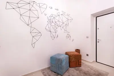a wall with a drawing on a wall at Tivoli Double in Ljubljana