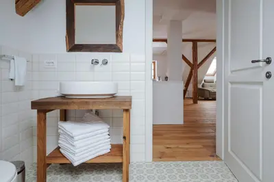 a bathroom with a sink and a mirror at Apartmaji Matec in Fala
