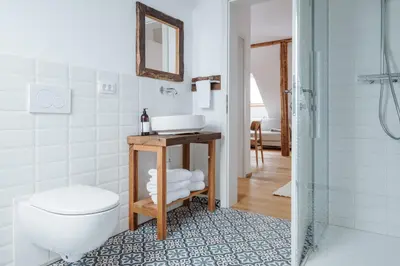a bathroom with a toilet and a sink at Apartmaji Matec in Fala