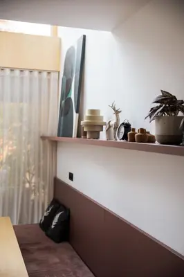 a room with a window and a shelf with plants at Lanina Chalet Luxury Mountain Escape in Pohorje