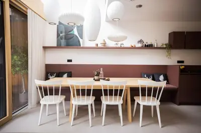 a dining room with a table and chairs at Lanina Chalet Luxury Mountain Escape in Pohorje