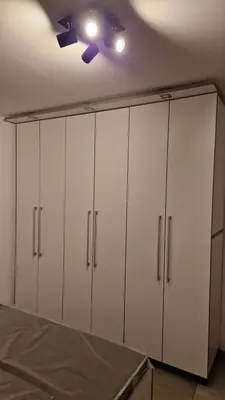 a room with white cabinets and a ceiling at Mark & Lana in Sežana