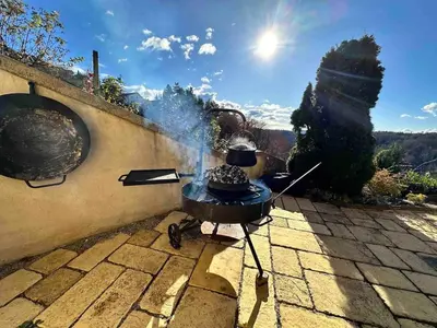 a bbq grill on the side of a wall at Luxury Panorama Villa • Pool, Quadro Sauna & Views