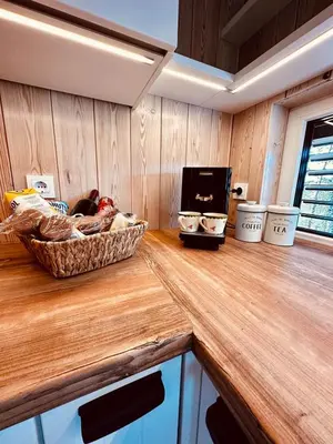 a kitchen counter with a bowl of food on it at Secluded Romantic Cabin · Hot Tub & Barrel Sauna
