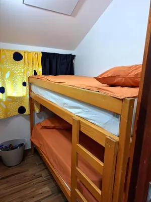 a bedroom with two bunk beds in a room at Boho House 6 camp Terme Catez with promotional tickets prices in Čatež ob Savi