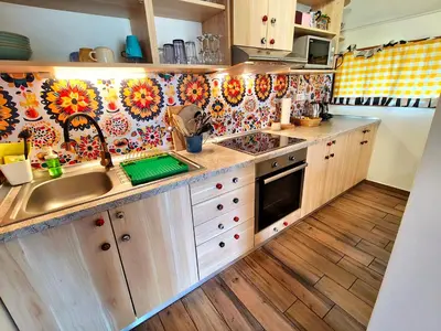 a kitchen with a sink and a counter top at Boho House 6 camp Terme Catez with promotional tickets prices in Čatež ob Savi