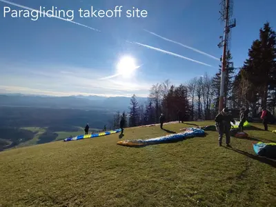 a group of people standing on top of a hill at Apartments Vila Ančka in Tržič