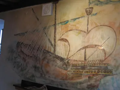 a wall with a painting of a heart on it at Guest House Rože in Ilirska Bistrica