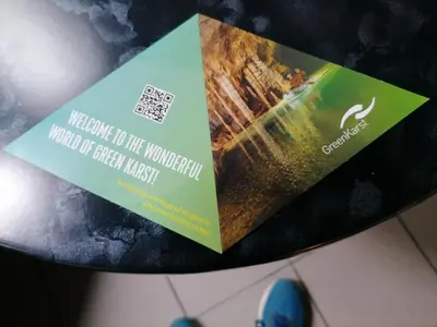 a book sitting on top of a table at Guest House Rože in Ilirska Bistrica