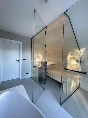 a bathroom with a glass walled shower in a room at Lanina Estate in Spodnje Hoče