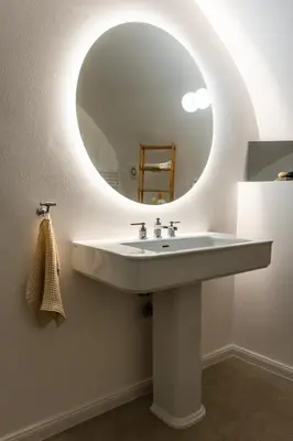 a bathroom with a sink and a mirror at Valka in Ljubljana