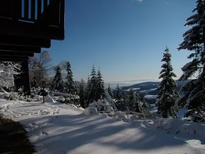 a path covered in snow next to a house at Holiday Home Tone in Frajhajm