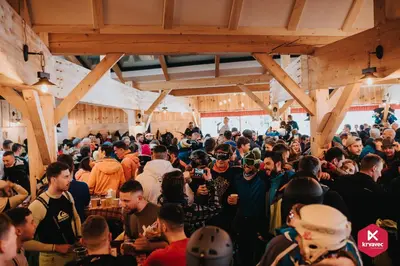 a crowd of people standing in a room at Apartmajska hiša Muštrinka in Cerklje na Gorenjskem