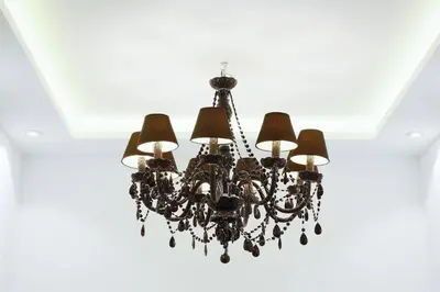 a chandelier hanging from a ceiling at WH Apartments in Ljubljana