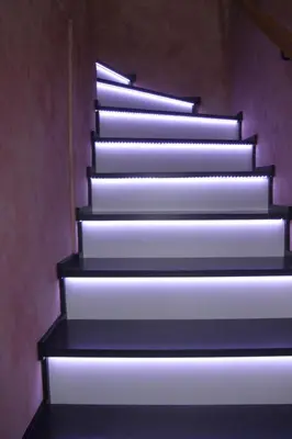 a set of stairs with lights on them at Apartment Borovnica in Moravske Toplice