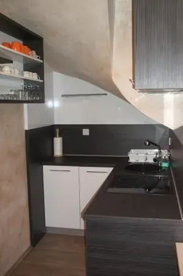 a kitchen with a sink and a stove top oven at Apartment Borovnica in Moravske Toplice
