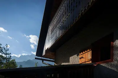 a building with a window on the side of it at Chalet Romantic in Zgornje Jezersko