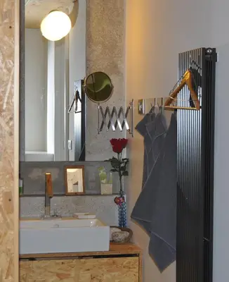 a bathroom with a sink and a mirror at Holiday Home Hisa Gusta in Most na Soči