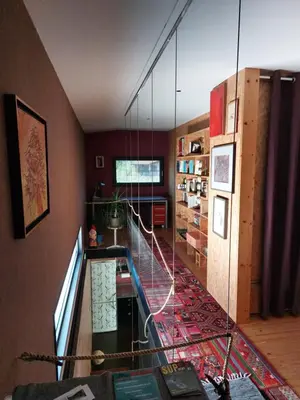 a room with a staircase with a glass wall at Holiday Home Hisa Gusta in Most na Soči