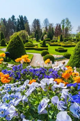 a garden with colorful flowers and a pathway at Počitniška hiška Pod Skalco in Kamnik
