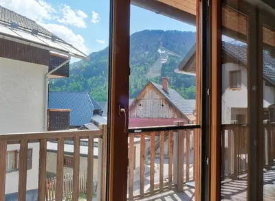 a view from the balcony of a house at Jacobs Resort House Kranjska Gora in Kranjska Gora