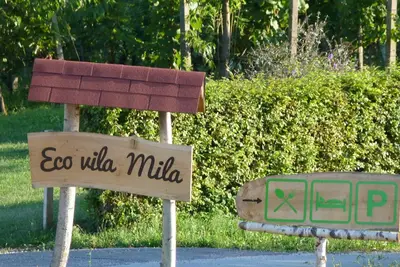 two signs that say go wildlife milka on a street at Guest House Eco Vila Mila in Rogaška Slatina