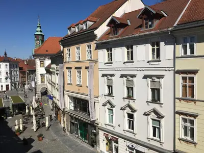 a view of a street in a city with buildings at Neoclassical Luxury Apartment Ljubljana in Ljubljana