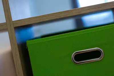 a green box sitting on top of a table at Podkoren Apartments in Kranjska Gora