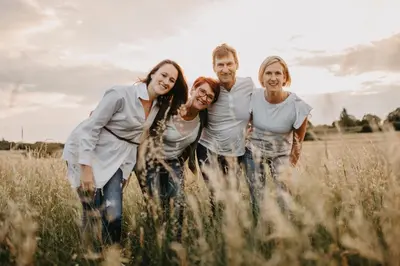 a group of people standing in a field at Casa Krasna Gourmet Boutique Hotel in Lokev