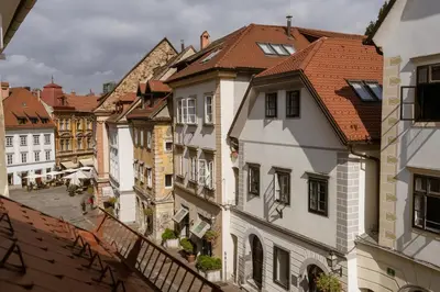 an overhead view of a city street with buildings at Allegro Hotel in Ljubljana
