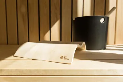 a paper bag sitting on top of a mattress at Hotel Boka in Bovec