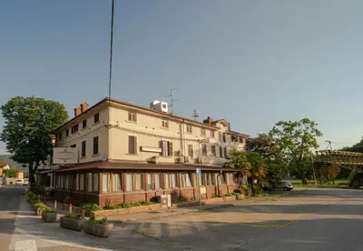 an old building on the side of a street at Hotel Paquito in Nova Gorica