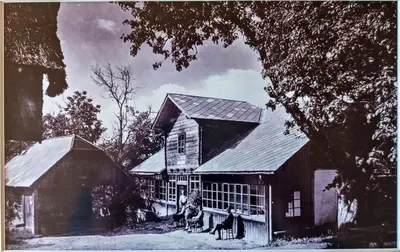 a black and white photo of a barn and a house at Hotel Celjska Koca in Celje