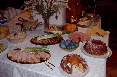 a table with many different types of bread and pastries at Hotel Kovac in Osilnica