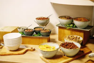 a group of bowls of food on a table at Bit Center Hotel in Ljubljana