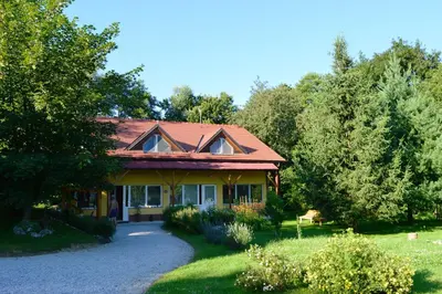 a house with a pathway in front of it at Apartments Vita Center in Rogaška Slatina