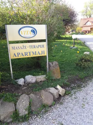 a sign for istg at Apartments Vita Center in Rogaška Slatina
