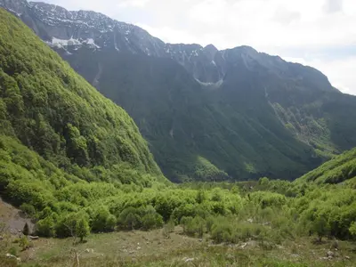 a view of a valley in a mountain range at Bezgova Hišica in Bovec