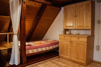 a bedroom with a bunk bed in a room at TOP rafting center in Bovec