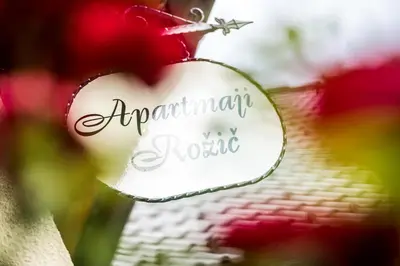 a heart shaped sign with the words aprilmite sauce at Apartments Rožič Bohinj in Bohinj