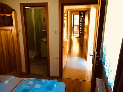 a hallway with a door leading into a room at Apartment Tisa in Solčava