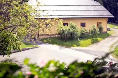 an empty road in front of a building at Tourist farm Mraz in Podčetrtek